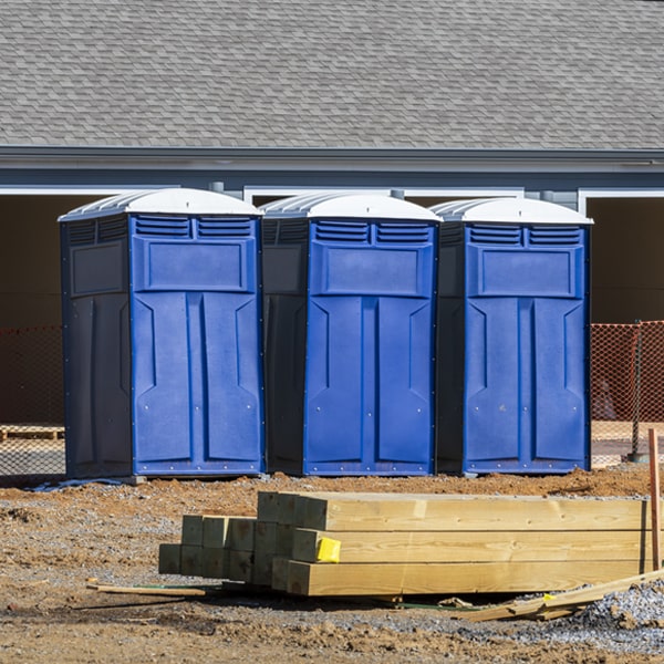 how often are the portable restrooms cleaned and serviced during a rental period in Arlington Michigan